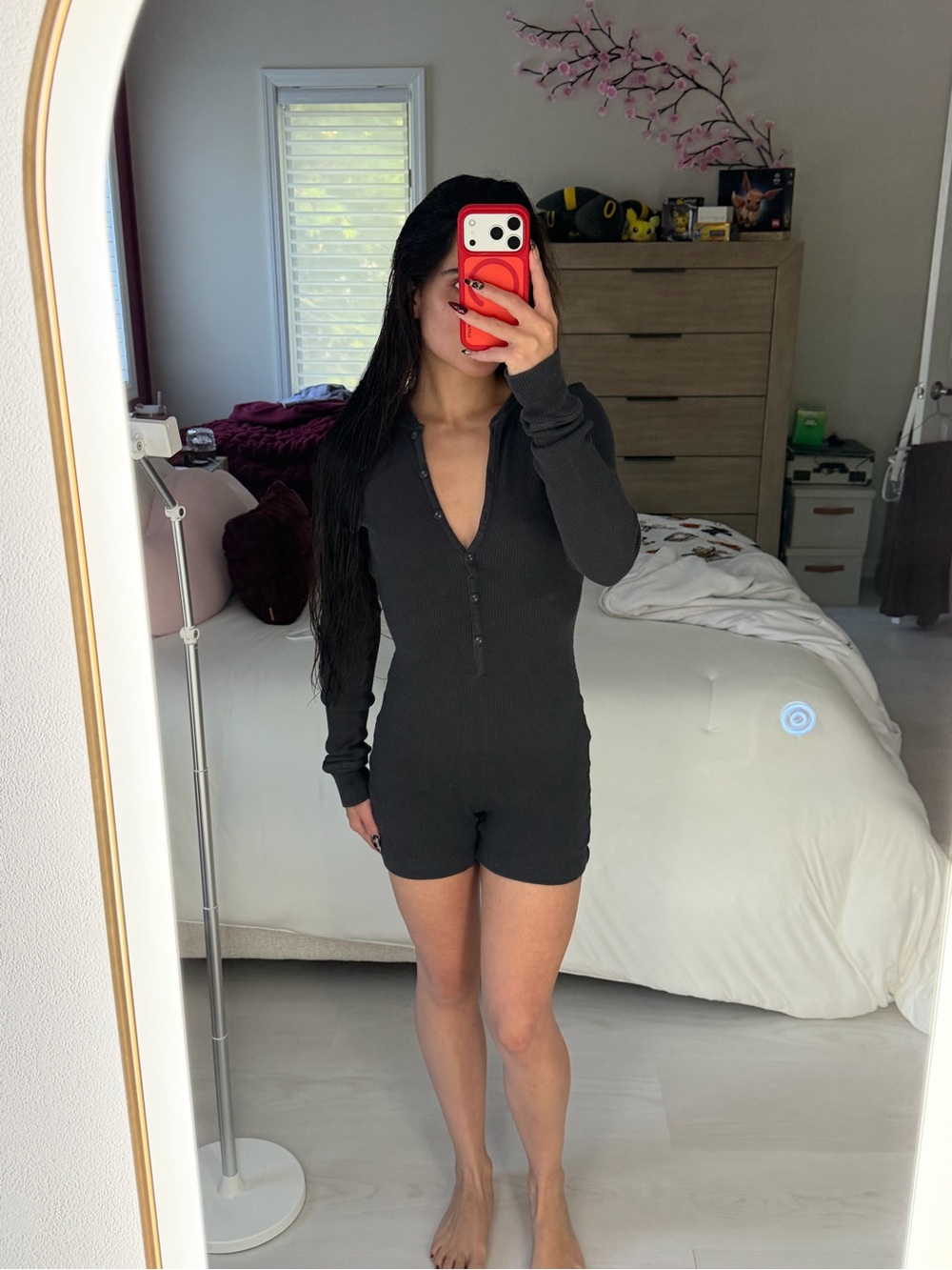 SKIMS Long-Sleeve Henley Bodysuit Romper